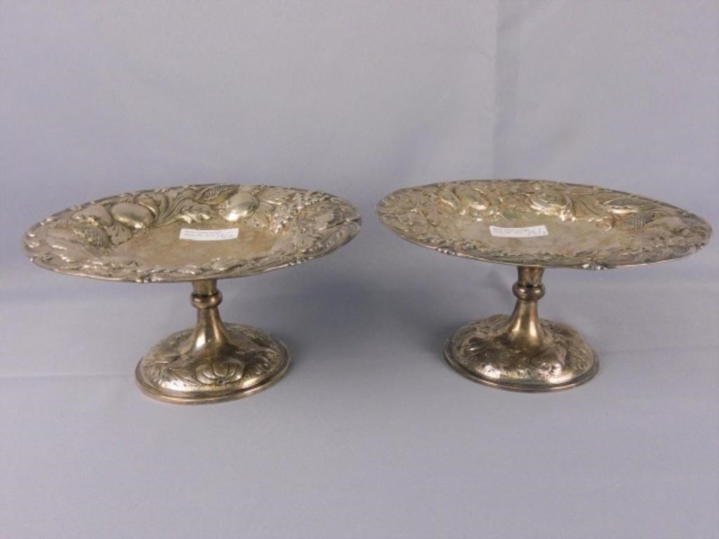 PAIR OF STERLING SILVER FOOTED