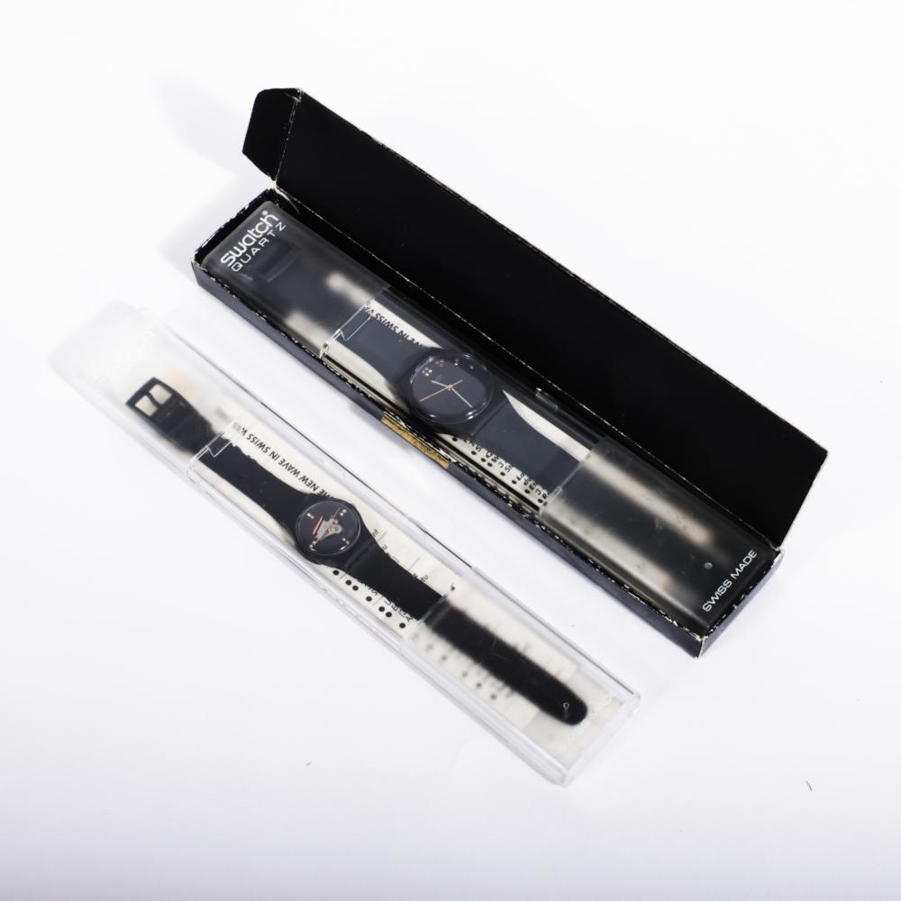 PAIR OF SWATCH WATCHES WITH BLACK