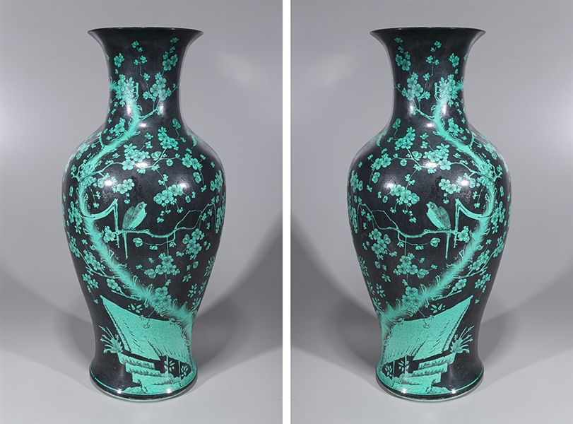 Pair of tall Chinese black ground