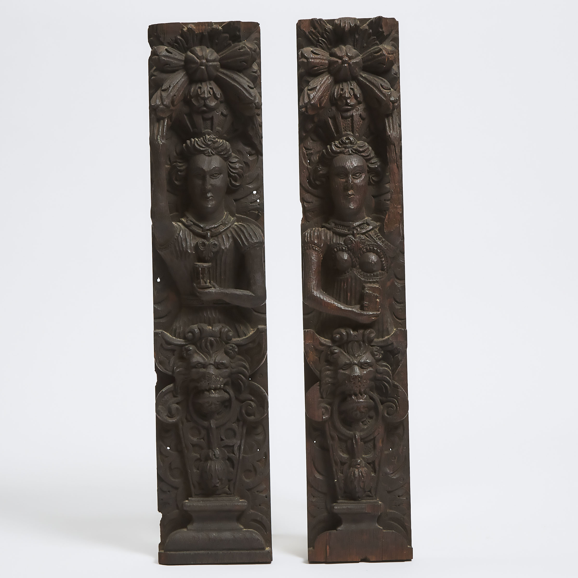 Pair of Tudor Carved Oak Figural