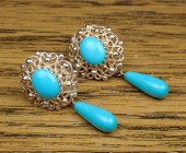 PAIR OF TURQUOISE AND FOURTEEN
