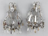 Pair of two arm brass and carv