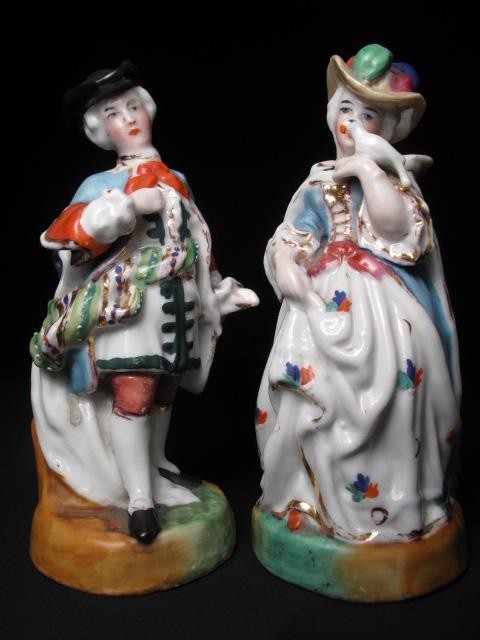 Pair of two pottery figurines