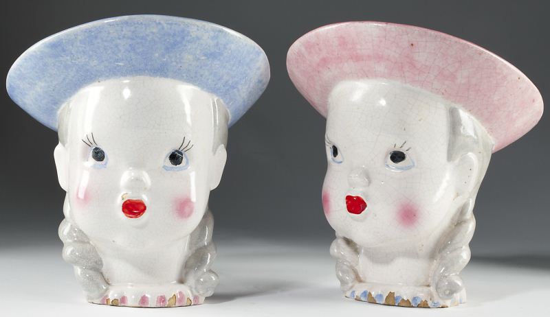 Pair of Vintage Head Vaseseach of a