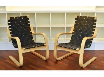 Pair of vintage maple and webbed