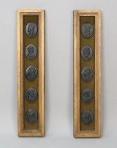 PAIR OF WALL PLAQUES WITH CLAS