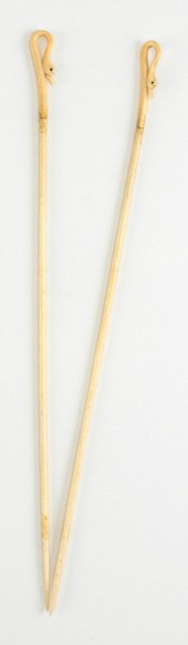 PAIR OF WHALEBONE AND IVORY KN