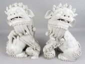 PAIR OF WHITE CERAMIC BUDDHIST