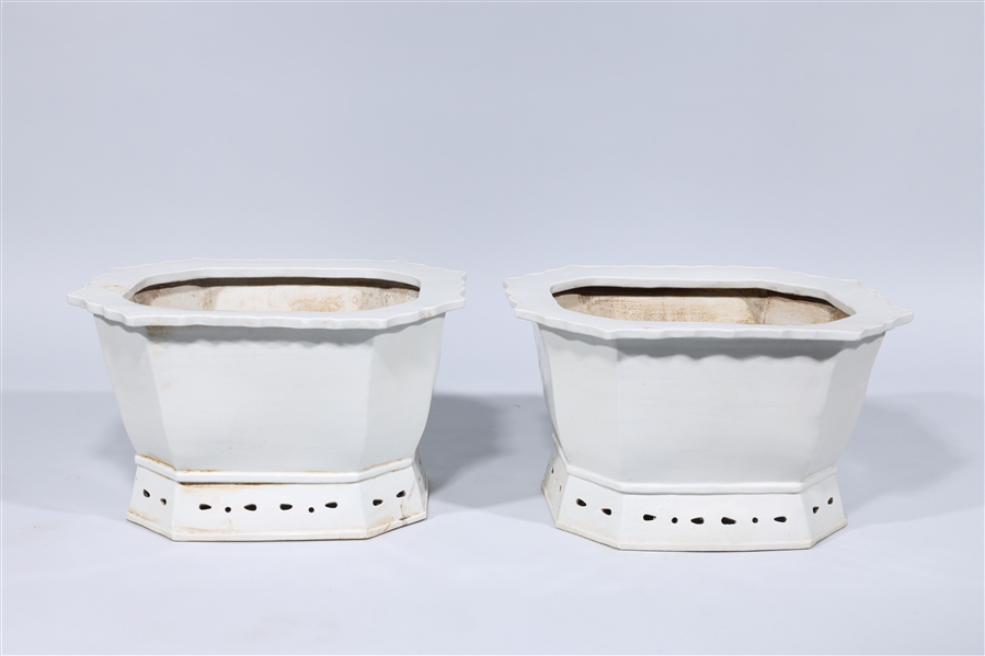 Pair of white glazed octagonal