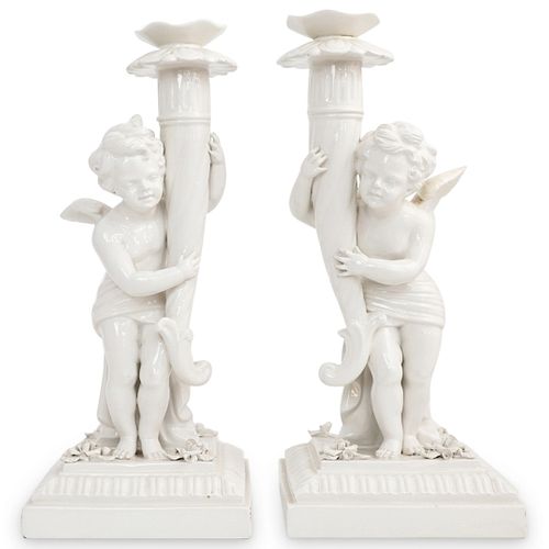 PAIR OF WHITE PORCELAIN CHERUB
