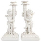 PAIR OF WHITE PORCELAIN CHERUB