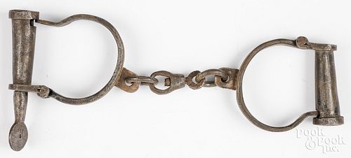 PAIR OF WROUGHT IRON HANDCUFFS WITH