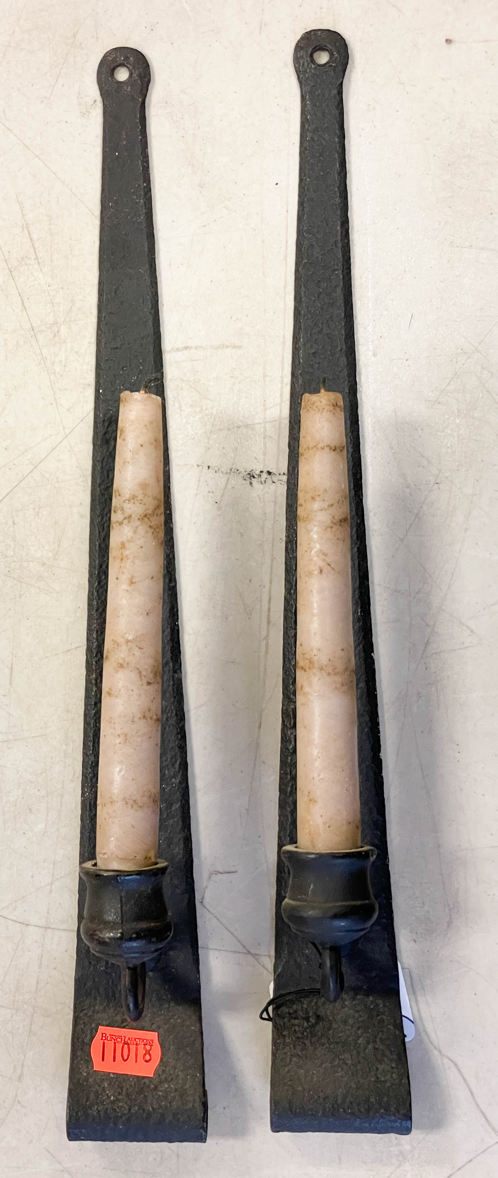 Pair of wrought iron hinge candle