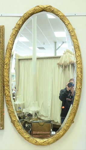 PAIR OVAL GILT MIRRORS, WITH
