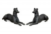PAIR PAINTED CAST IRON RECUMBE