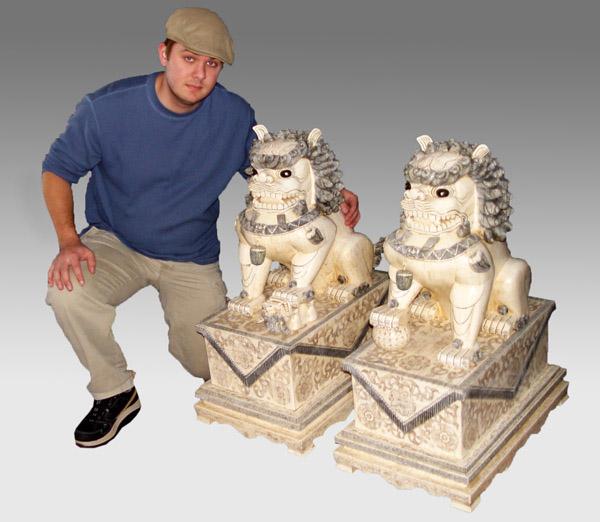 PAIR PALATIAL BONE CLAD FOO DOGS: