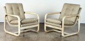 PAIR PARCHMENT COVERED UPHOLST