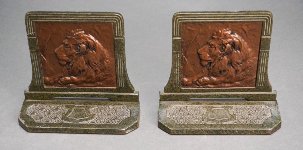 PAIR PATINATED METAL LION