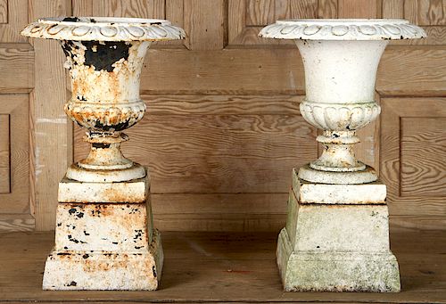 PAIR PETITE CAST IRON URNS PLINTH