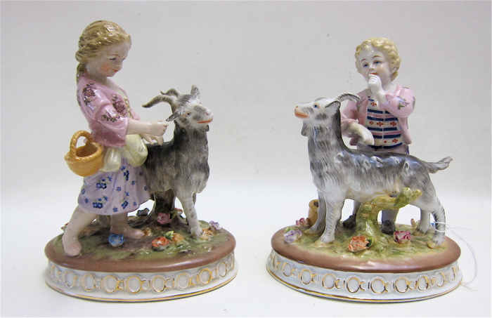 PAIR PORCELAIN FIGURINES boy and