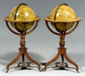 Pair Regency Newton's globes,