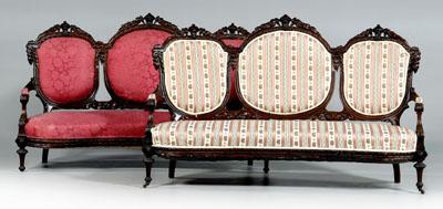 Pair rococo revival carved settees: