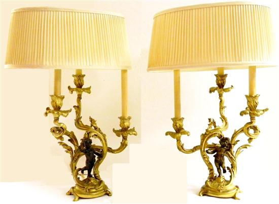 Pair Rococo style cherub lamps 