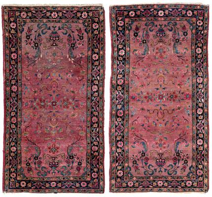 Pair Sarouk rugs: both with