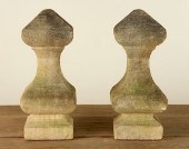 PAIR SHAPED CARVED STONE ARCHI