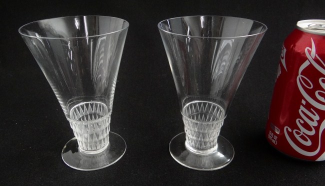 Pair signed Lalique cups.
