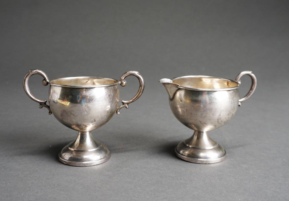 PAIR WEIGHTED STERLING SILVER SUGAR