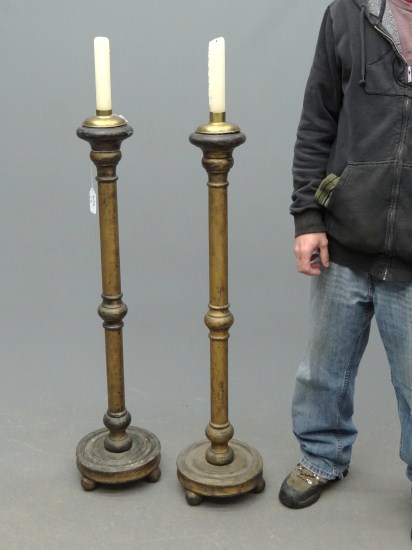 Pair wooden candle floor standards.