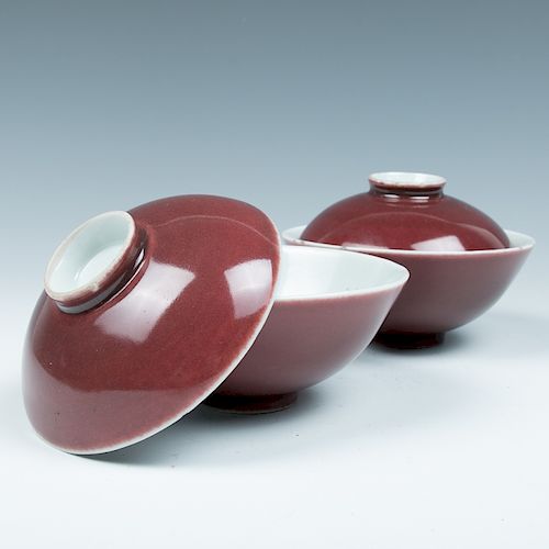 PAIRE OF COPPER RED COVERED BOWLTwo
