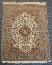 PAKISTAN RUG AND A KERMAN RUG,