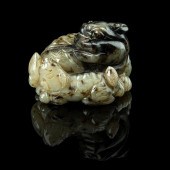 PALE CELADON JADE CARVING OF A