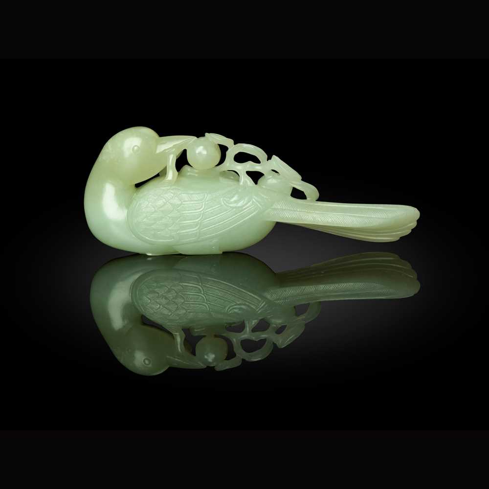 PALE CELADON JADE CARVING OF A
