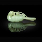 PALE CELADON JADE CARVING OF A