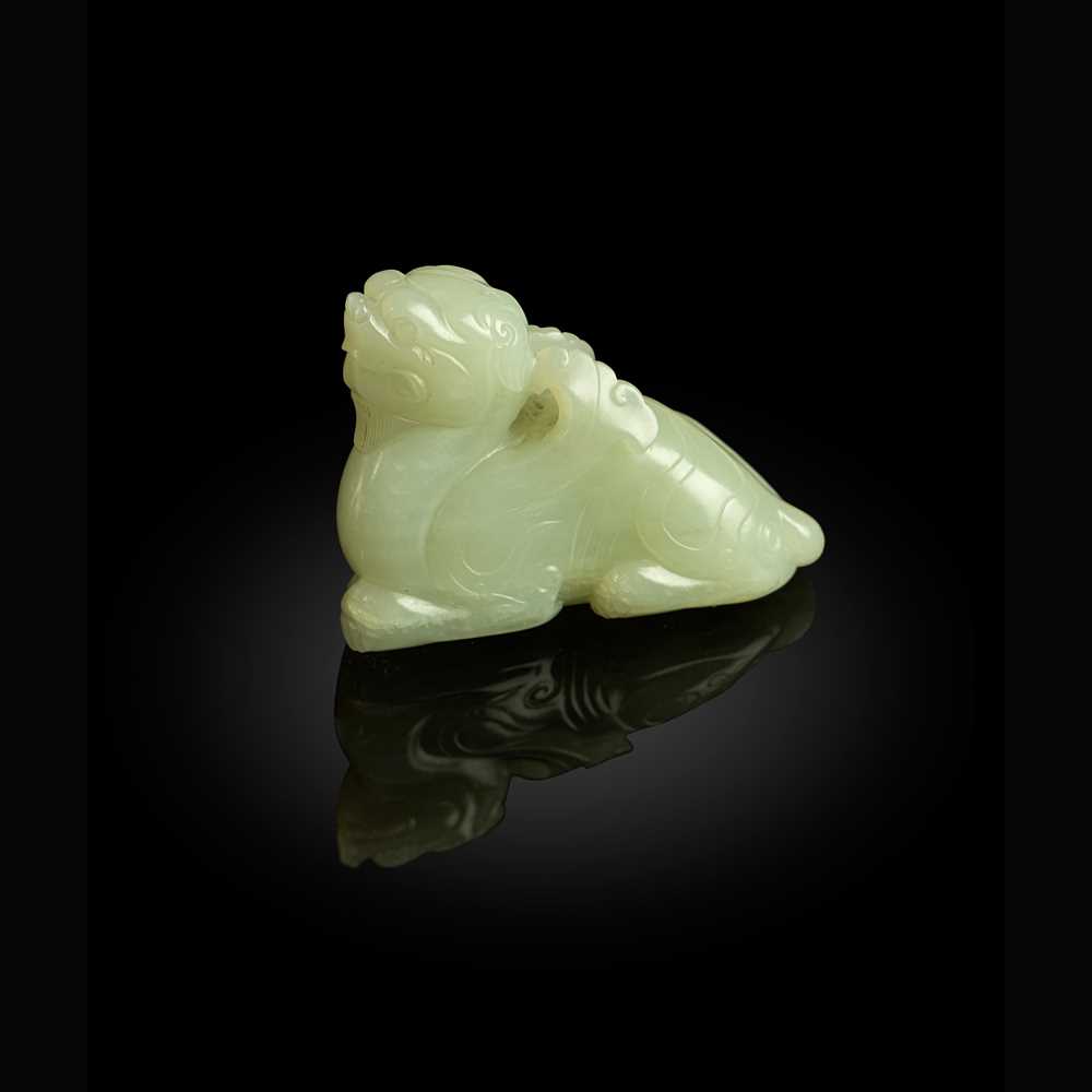 PALE CELADON JADE CARVING OF A