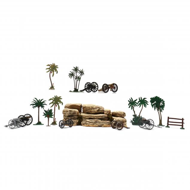 PALM TREES, A ROCKY OUTCROP AND