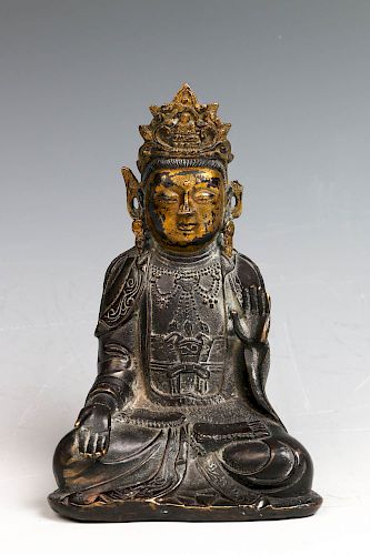 PARCEL GILT BRONZE SEATED FIGURE OF
