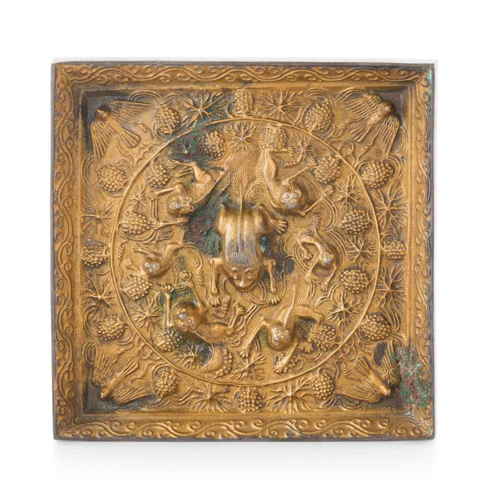 PARCEL-GILT BRONZE SQUARE 'LION AND