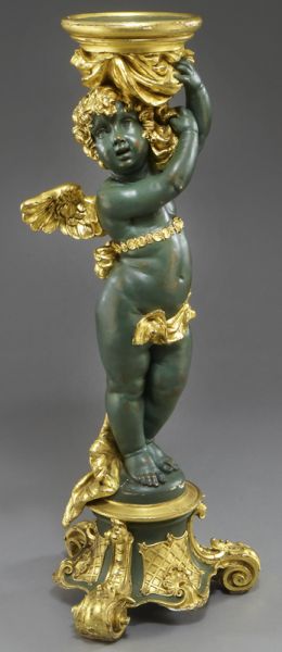 Parcel gilt carved wood cherub