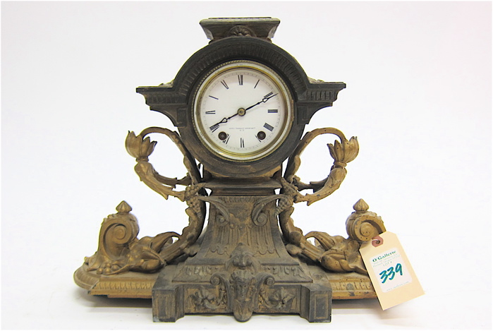 PARCEL-GILT METAL-CASED MANTEL