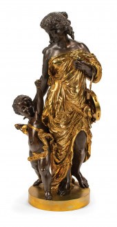 PATINATED AND GILT BRONZE BACC