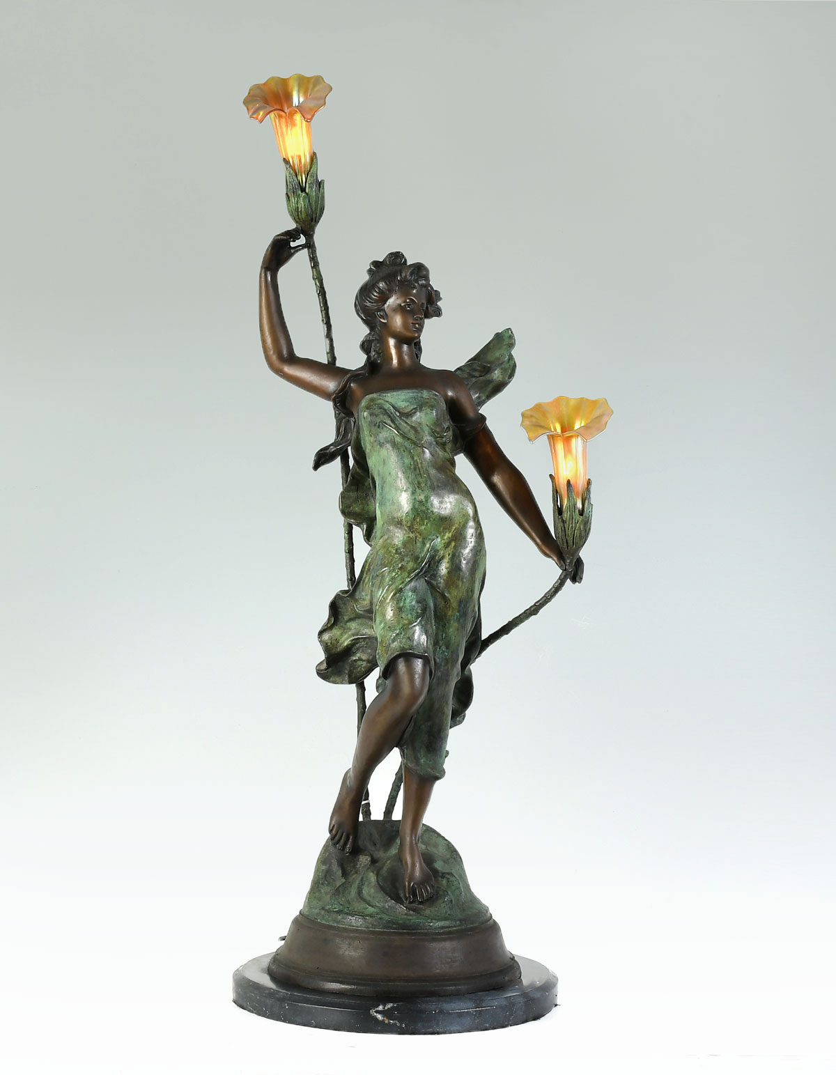 PATINATED BRONZE FEMALE SCULPTURE