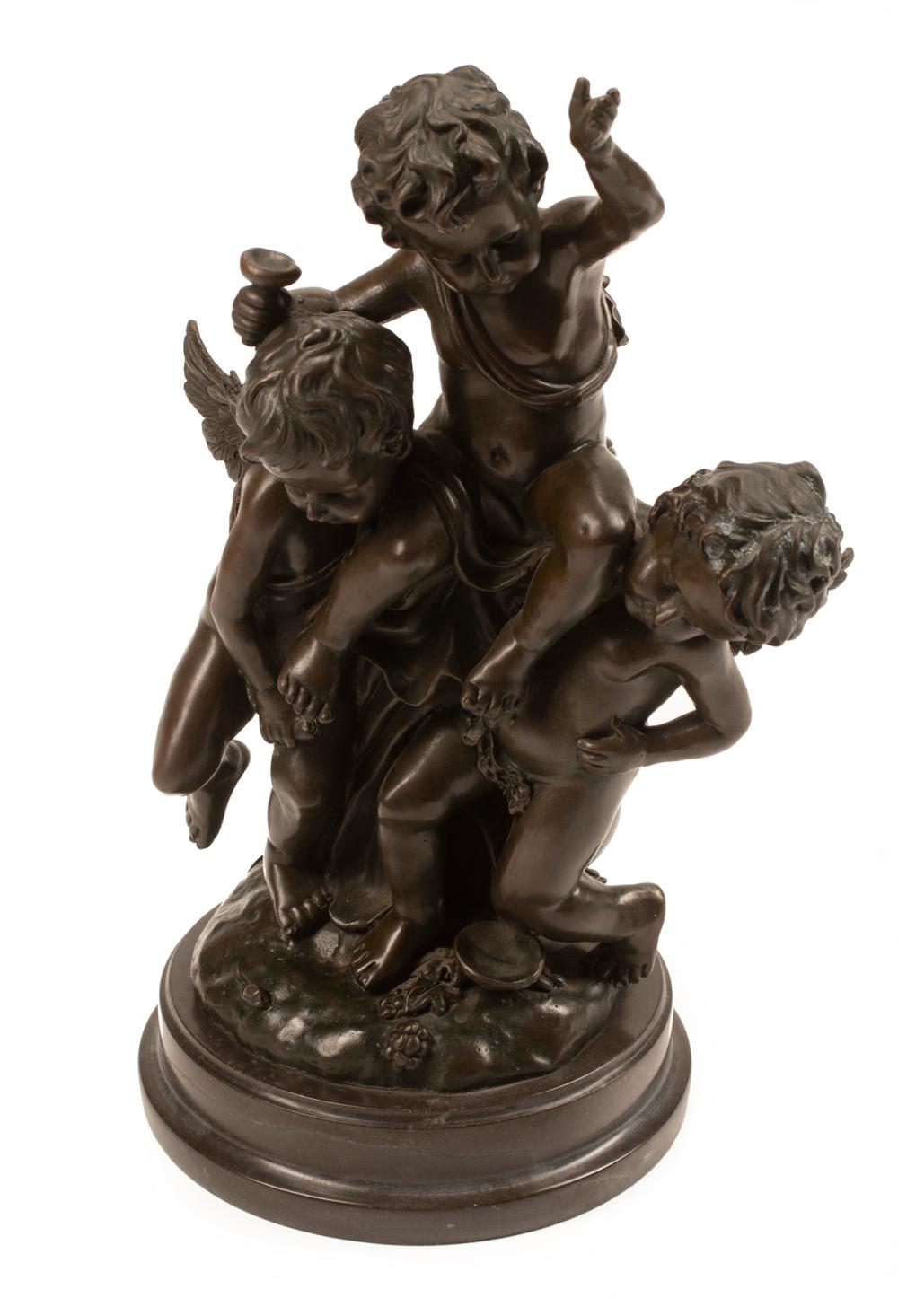 PATINATED BRONZE FIGURAL GROUP OF