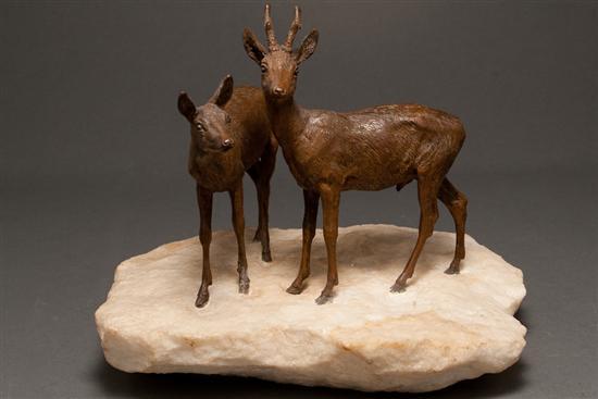 Patinated bronze figural group of