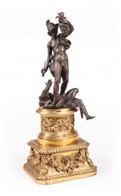 PATINATED BRONZE FIGURAL OF PE