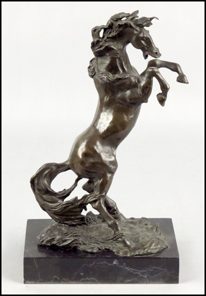 PATINATED BRONZE FIGURE OF A