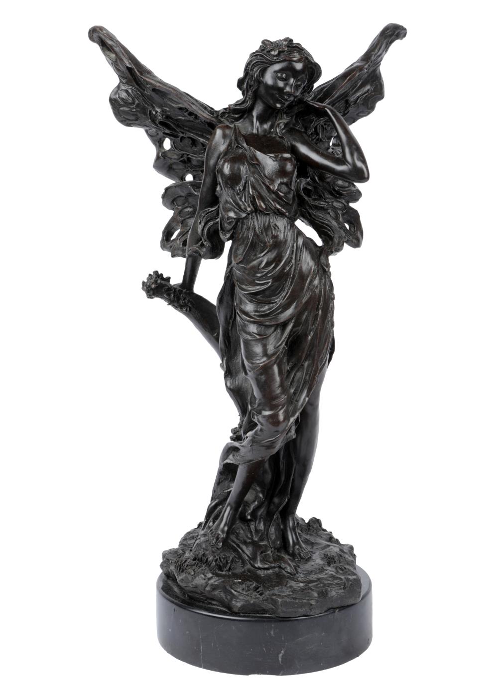 PATINATED BRONZE FIGURE OF A